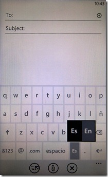 Windows phone 7 will let you switch languages easily, if the carrier allows it....