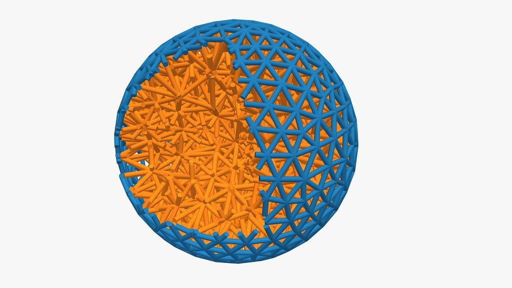 orange elastic ball wrapped in a layer of tiny robots