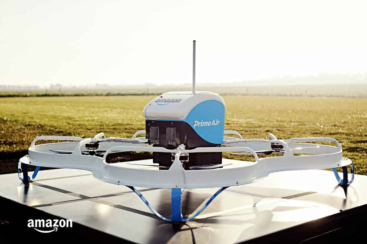 Amazon Prime Air drone on a platform in the middle of an open field with grasses