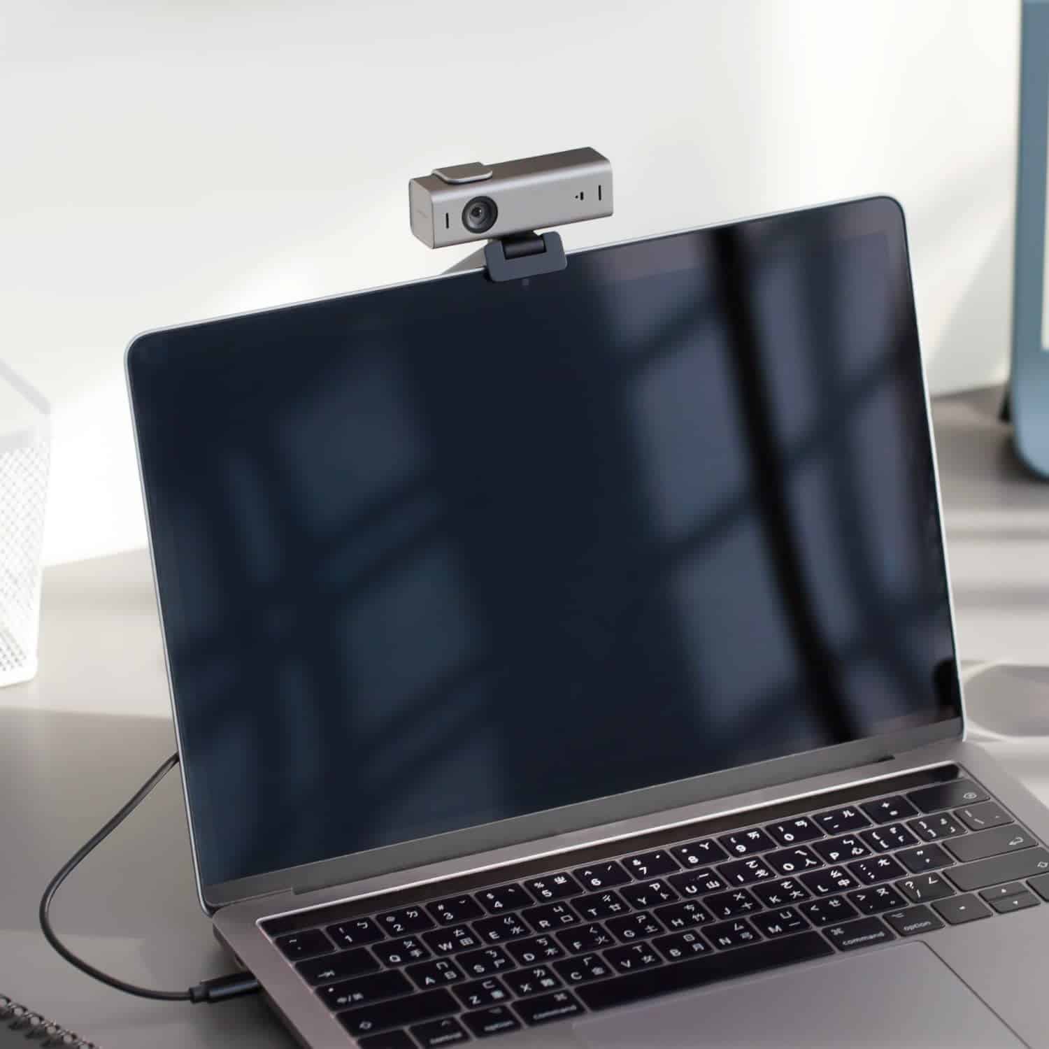 Lumina AI Webcam attached to a laptop