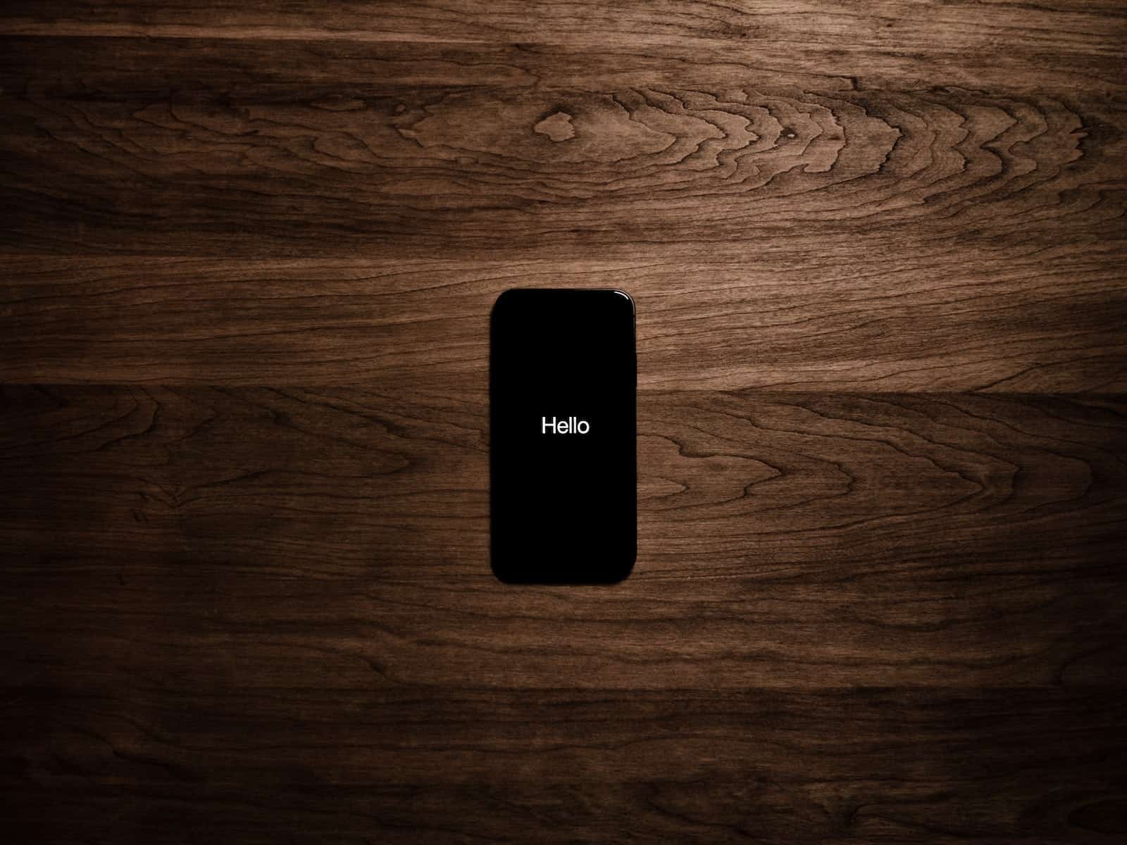 Turned on Black Iphone 7 Displaying Hello