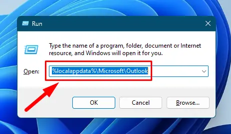 Type %localappdata%\Microsoft\Outlook