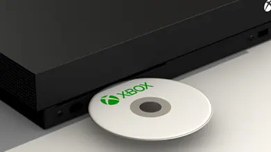 Inserting disc on Xbox