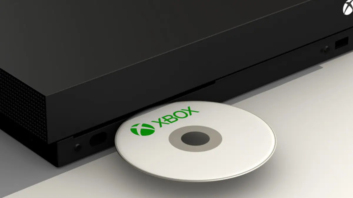 Inserting disc on Xbox